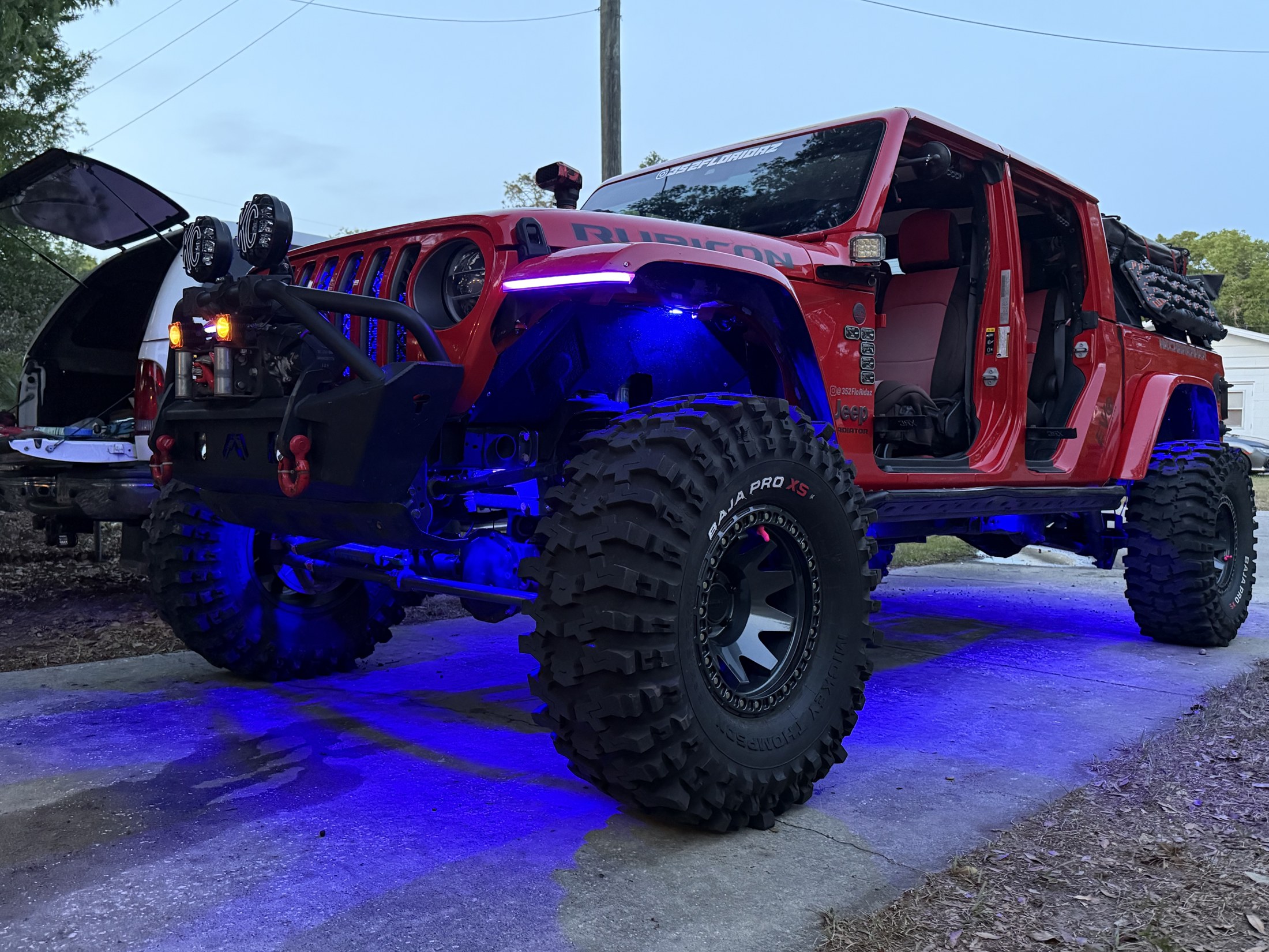 NeckBreaker Jeep Gladiator Rubicon with blue glow driveway lighting